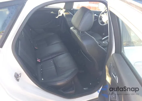 2013 Ford Focus Titanium из США, поврежденный, VIN 1FADP3N28DL136301